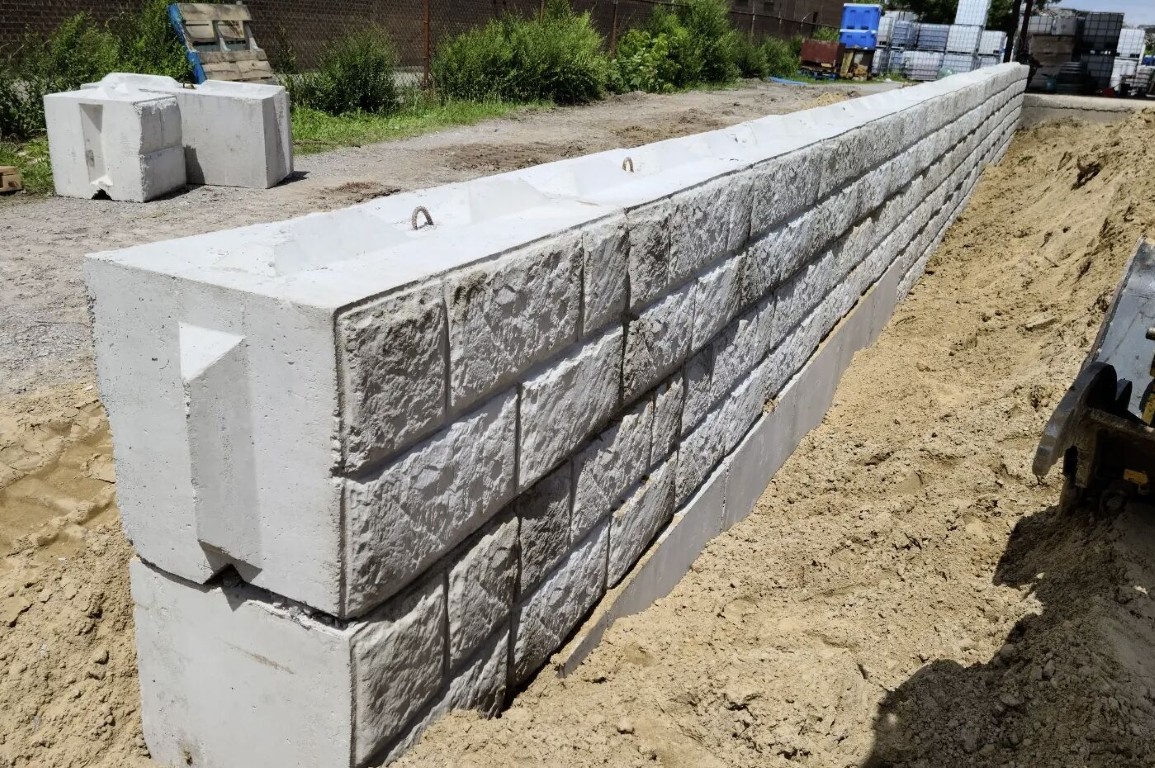 Large concrete masonry retaining wall construction project